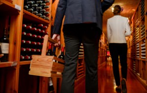 Young couple buying wine in a store